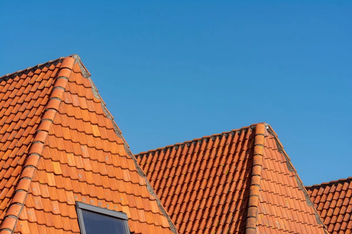 Clay barrel tile rooflines on homes in Little Rock, AR